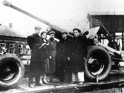 Young workers of the Molotov Plant near the equipment assembled ahead of the schedule.