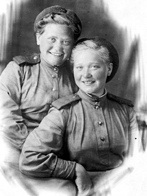 Servicewomen of the 22nd Anti-Aircraft Machine Gun Regiment Roza Ageeva and Vera Gustokashina. Group portrait. [not earlier than 1943]. Moscow region. Perm City Archive.