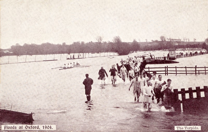 Torpids (a university Rowing competition) during floods on the Isis