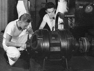 University of Louisville V-12 participants working with a dynamo, circa 1943. From the College of Arts & Sciences V-12 photo display, University of Louisville Archives & Special Collections.